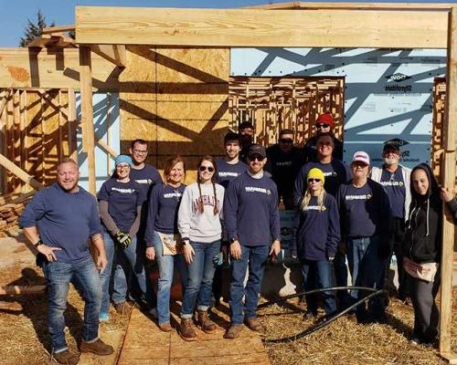 Oklahoma City employees volunteer to build homes with Habitat for Humanity